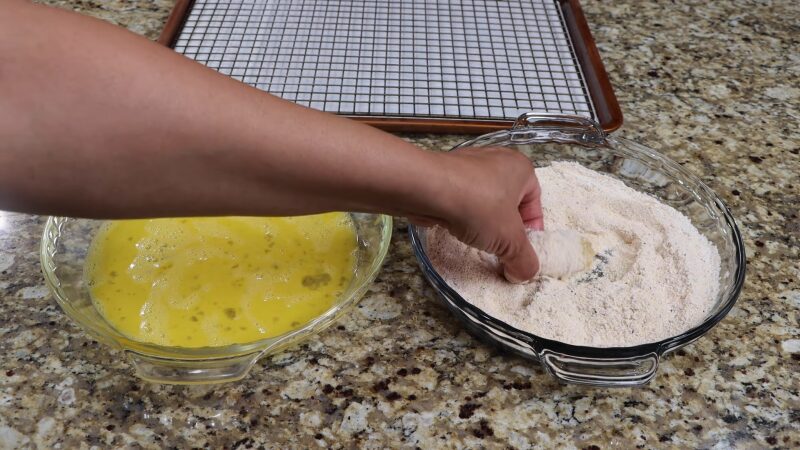 To Coat the Catfish Nuggets, Dip Them in Seasoned Flour