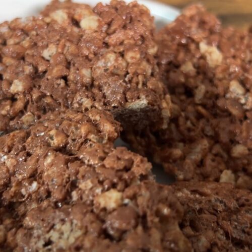 Close-up view of chocolate-covered rice crispy treats